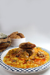 Traditional Rajasthani food Daal Bati Churma.made with wheat flour and served with tadke wali dal.