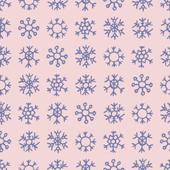 Seamless background of hand drawn snowflakes