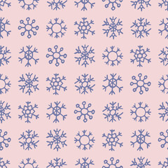 Seamless background of hand drawn snowflakes