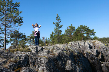 Obraz premium Woman on island in Ladoga skerries