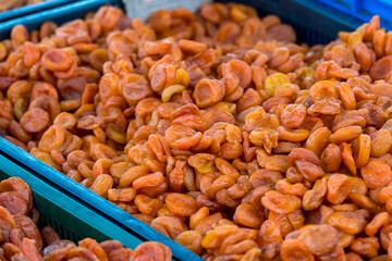 dried apricot in a box for sale in the market