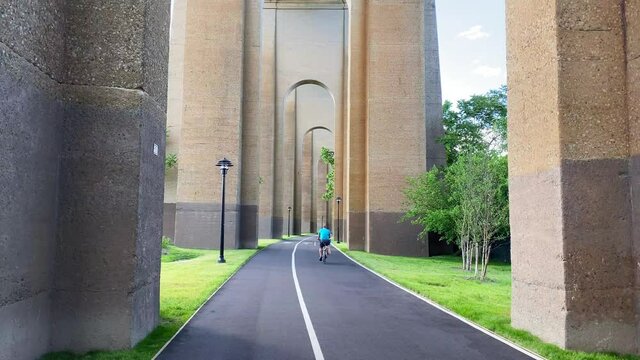View of the Walking Trail Under the Hell Gate Bridge
