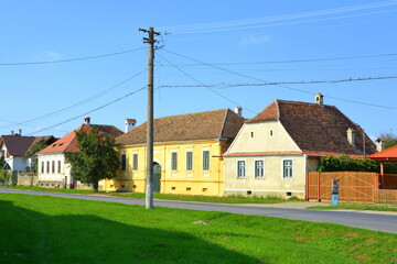 Typical rural landscape and peasant houses in  the village Cincsor, Kleinschenk, Transylvania, Romania. The settlement was founded by the Saxon colonists in the middle of the 12th century