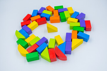 Untidy variety colorful blocks sleep and yellower block standing to see them