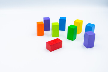 Untidy variety colorful blocks see sleep red block at white background