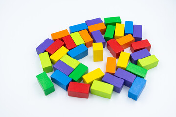 Untidy variety colorful blocks sleep and yellower block standing to see them