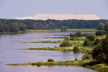 View over the Elbe near Magdeburg with the slagheap of a salt mine on the horizon