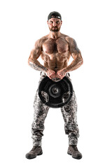 Muscular athlete bodybuilder man in camouflage pants with a naked torso workout with dumbbell on a white background. Isolate