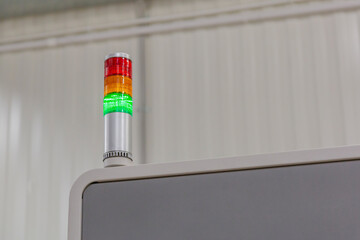 Multicolored lamp indicator of the operation of industrial equipment in a production workshop
