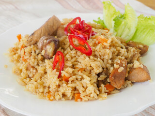 plate with pilaf, hot pepper and herbs. national cuisine. Oriental food.