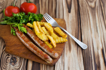 grilled sausages with french fries