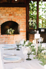 Festive table setting for birthday or wedding in style of rustic, boho. Decor in natural colors. Selective focus. 