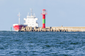 SEA WATER ON A SUNNY CLEAR DAY - Seascape with a ship in the background
