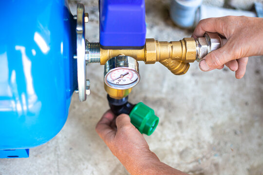 Installation Of A Water Supply Station To The House Using A Hydraulic Accumulator. Pumping Station.