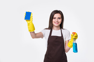Young housewife cleaning with rug and detergent isolated on white background
