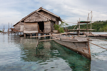 Fototapeta na wymiar Sea gypsy tribe floating village. Sulawesi Indonesia. 