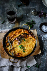 Greek moussaka in a  frying pan.