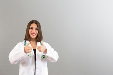 Beautiful smiling Turkish woman doctor portrait in studio she is confident mood, she is gesturing...