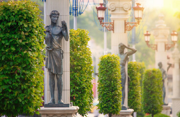 The central street of Irpen, with thuja and statues.
