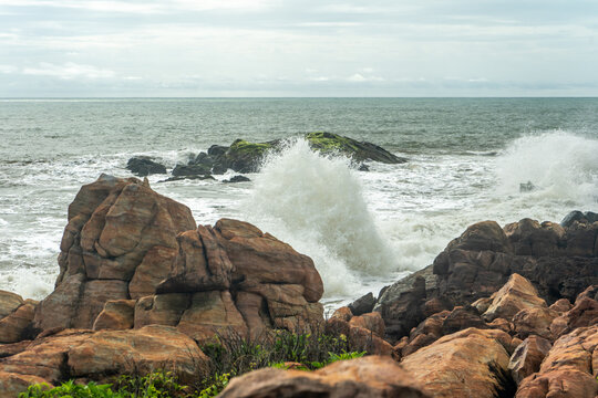 Mesmerizing shot of a beautiful and rocky Malvan beach in India