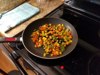 frying pan with vegetables