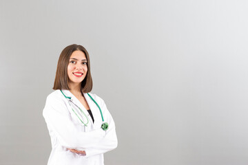 Beautiful smiling Turkish woman doctor portrait in studio she is confident mood