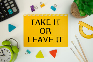 Blank notepad with text Take it or Leave it on an office desk
