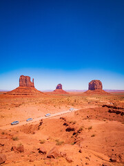 Fototapeta na wymiar Monument Valley from visitor center, region of Colorado Plateau characterized by cluster of vast sandstone buttes, Arizona Utah border.