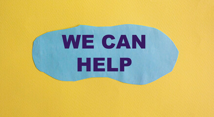 We can help you. Text on blue piece of paper and yellow background