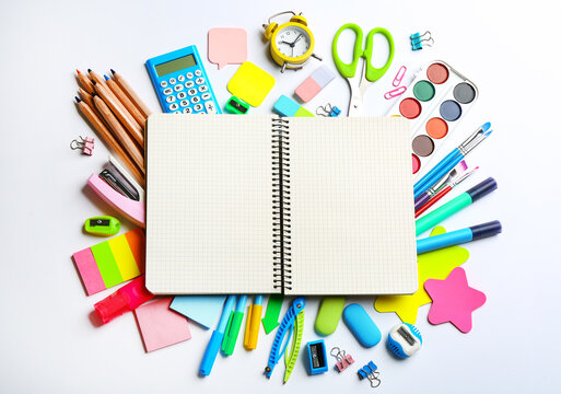 Blank notebook and school stationery on white background, flat lay with space for text. Back to school