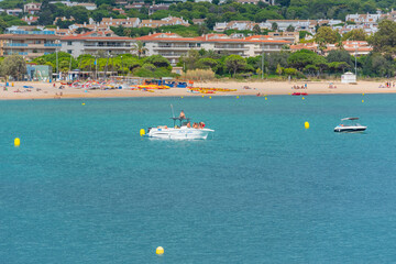 View of Sant Pol beach in the village of Sant Feliu de Guixols at Costa Brava in Catalonia, Spain