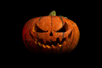 halloween pumpkin isolated on black background closeup