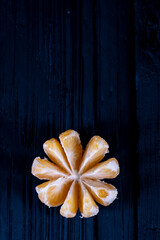 Fresh mandarin on black background