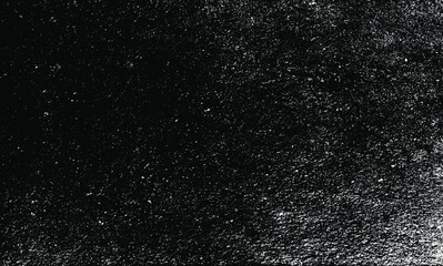Obraz premium Dark, uneven black and white texture vector. Distressed overlay texture. Grunge background. Abstract textured effect. Vector Illustration. Black isolated on white background. EPS10.