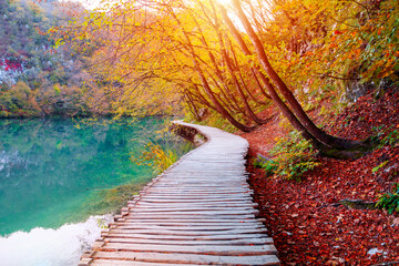 Famous Plitvice lakes with beautiful autumn colors and magnificent views of the waterfalls, ...