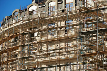 scaffolding and new building as background