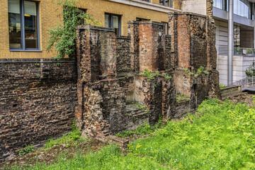 Ancient remains of old Roman city walls in London. Defensive London Wall, built to protect the Roman settlement of Londinium in the second - third century. London, UK.