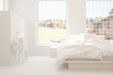 Fototapeta na wymiar White stylish minimalist bedroom with armchair and autumn landscape in window. Scandinavian interior design. 3D illustration