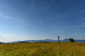  camera with tripod take photo on mountain beautiful view