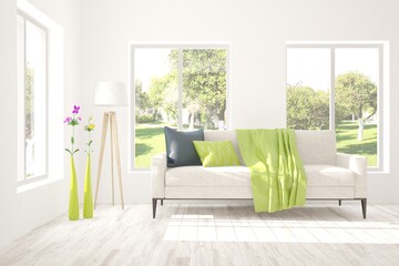 White living room with sofa and summer landscape in window. Scandinavian interior design. 3D illustration
