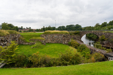 Bridge over Lagan river in Laholm on the Swedish west coast in autumn. Selective focus.