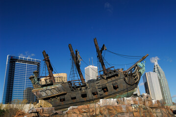 Black Pearl Pirate ship with Toronto city skyline and highrise towers