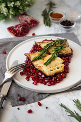 Cod fish with pomegranate seeds 