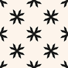 Fototapeta na wymiar Vector geometric floral pattern. Ornamental seamless texture in ethnic style. Abstract monochrome ornament with big flower shapes, crosses. Elegant black and white background. Repeat decorative design