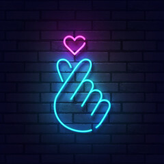 K-POP neon sign. Glowing neon light signboard of dog and cat pet house. Sign of Finger Heart with colorful neon lights isolated on brick wall. Vector illustration © Vladyslav