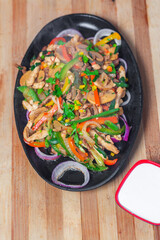 Chicken mushroom and capsicum stir fry recipe served on a sizzling plate. Chicken Fajita Recipe, Asian recipes.