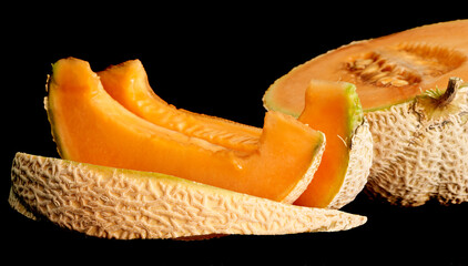 yellow melon on black background