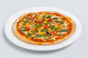 Hot fresh Chicken mushroom jalapeno pizza on white plate isolated white background. Homemade Pizza. Top views.