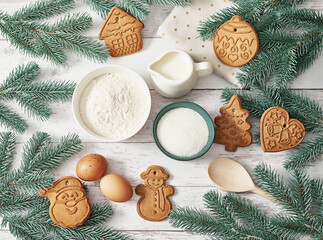 Fototapeta na wymiar Merry Christmas background tasty homemade ginger cookies. Ingredients for cooking baking, kitchen utensils, gingerbread. Happy new year greeting card. Xmas table. Fir tree, pine. Winter holidays