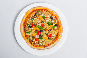 Hot fresh Chicken mushroom jalapeno pizza on white plate isolated white background. Homemade Pizza. Top views.